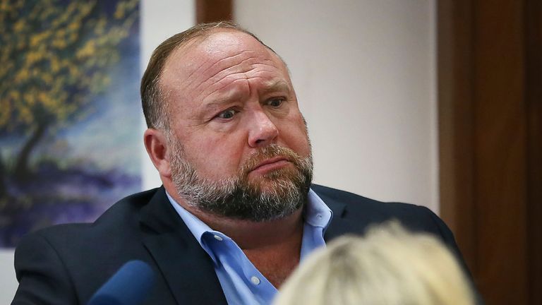CONSPIRACY THEORIST ALEX JONES SLAPPED WITH OVER $1 BILLION IN DAMAGES FOR YEARS OF CRUEL SLANDER OF SANDY HOOK MASSACRE VICTIMS’ FAMILIES.